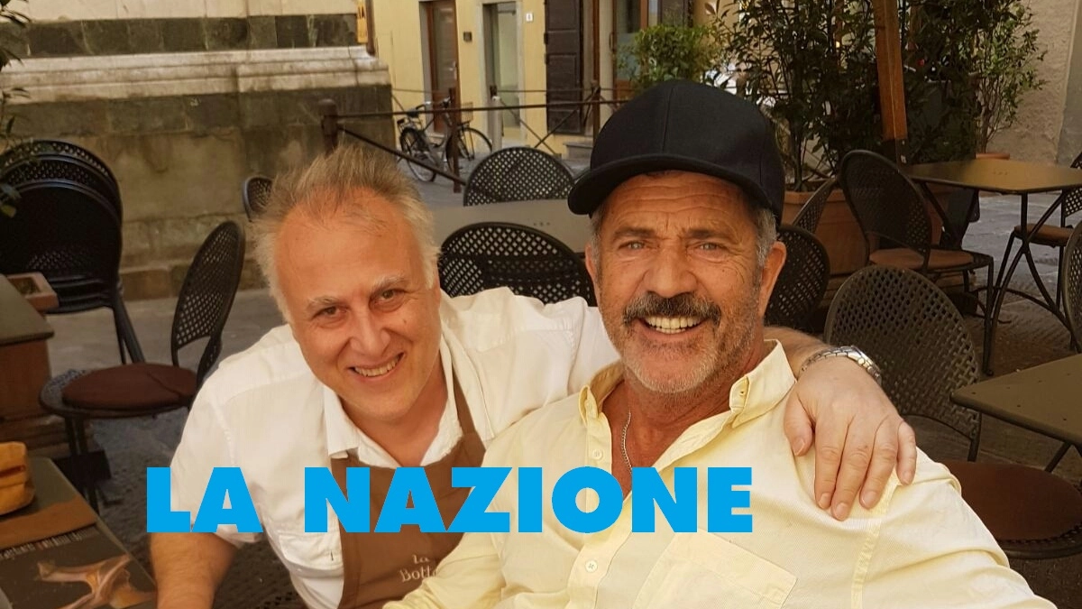 Mel Gibson alla Bottegaia con uno dei titolari (FotoCastellani)