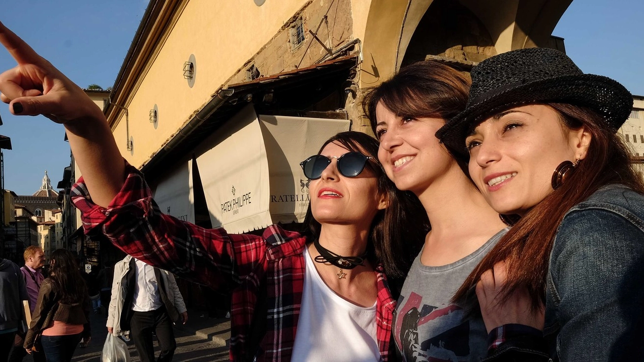 Tre turiste al Ponte Vecchio