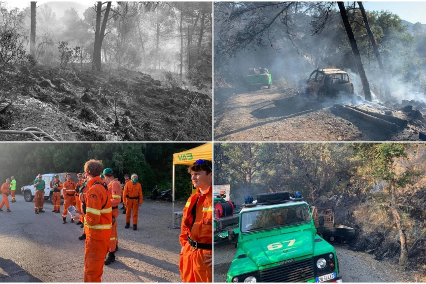 I danni dell'incendio il giorno dopo. In basso a sinistra squadre dell'antincendio