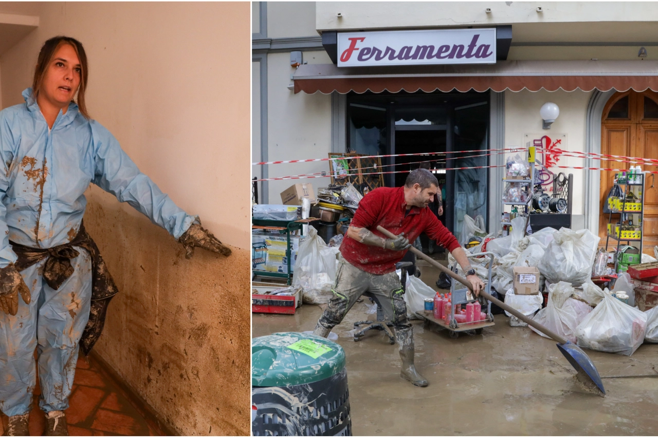 Una donna mostra dove è arrivata l'acqua. I danni in un ferramenta. (Fotoservizio Germogli a Campi Bisenzio)