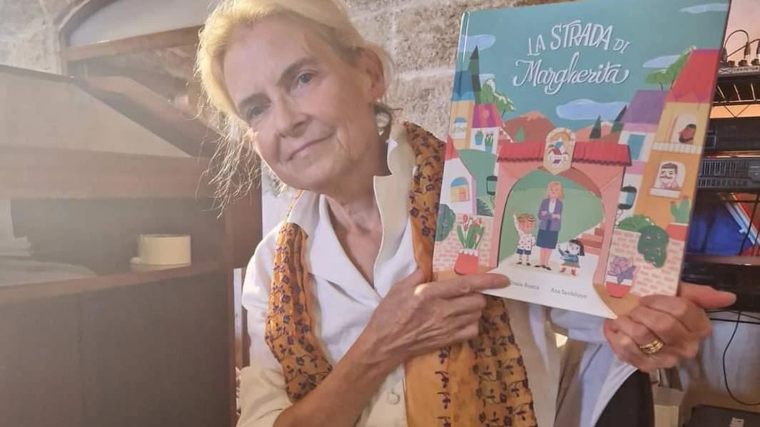 Un albo illustrato promuove l'educazione paritaria delle strade di Corrinsù, dove i bambini scelgono i nomi delle vie. Il libro "La strada di Margherita" affronta il dibattito sulle denominazioni femminili.