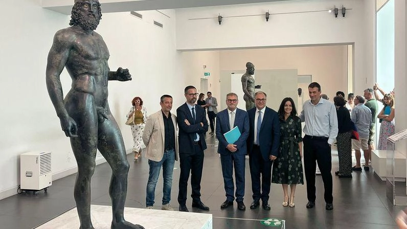 I due sindaci di San Casciano e Reggio e i curatori della mostra tra i Bronzi di Riace