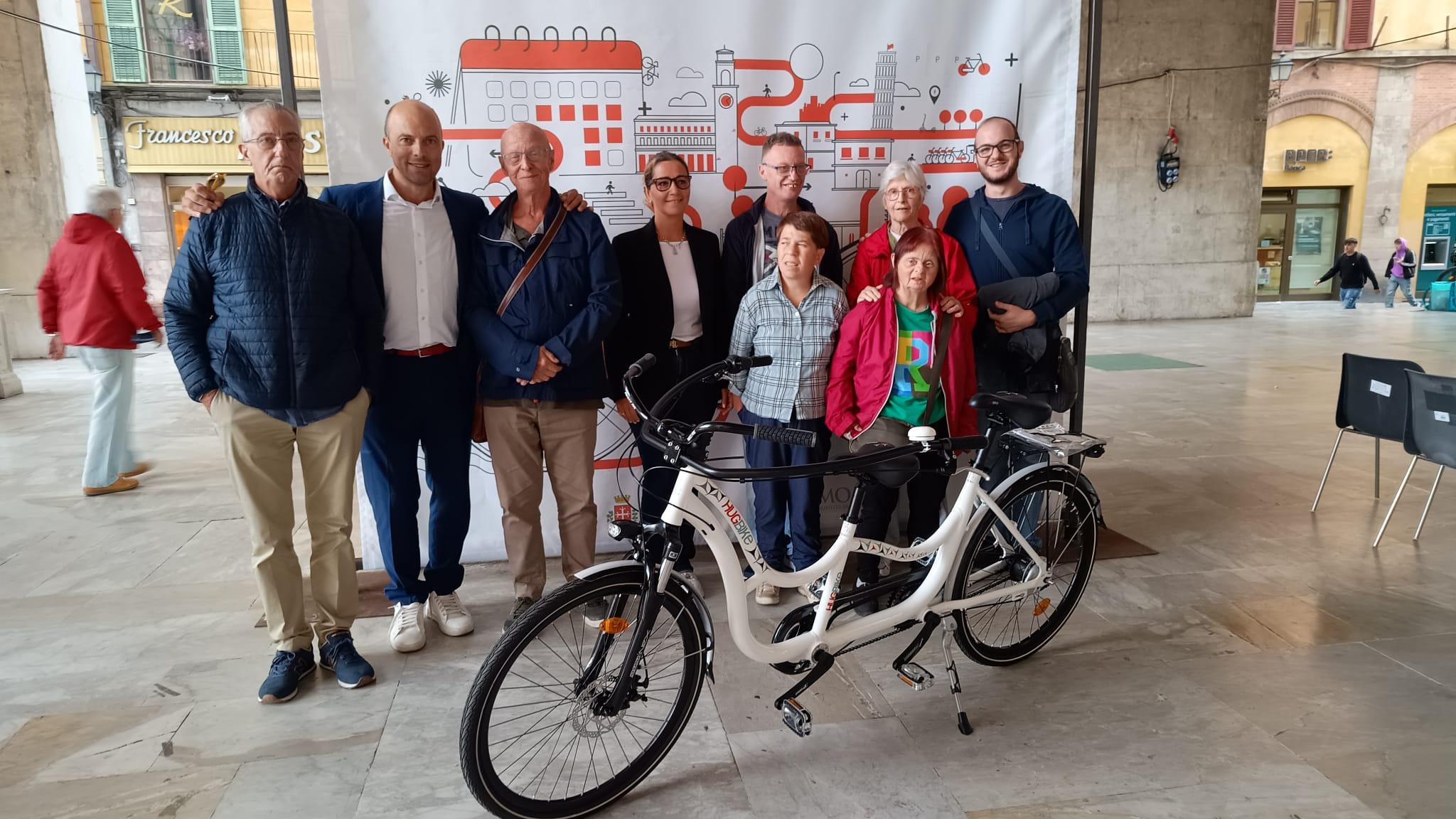 Sociale: Pisamo dona una hugbike all’Associazione Dinsi une man