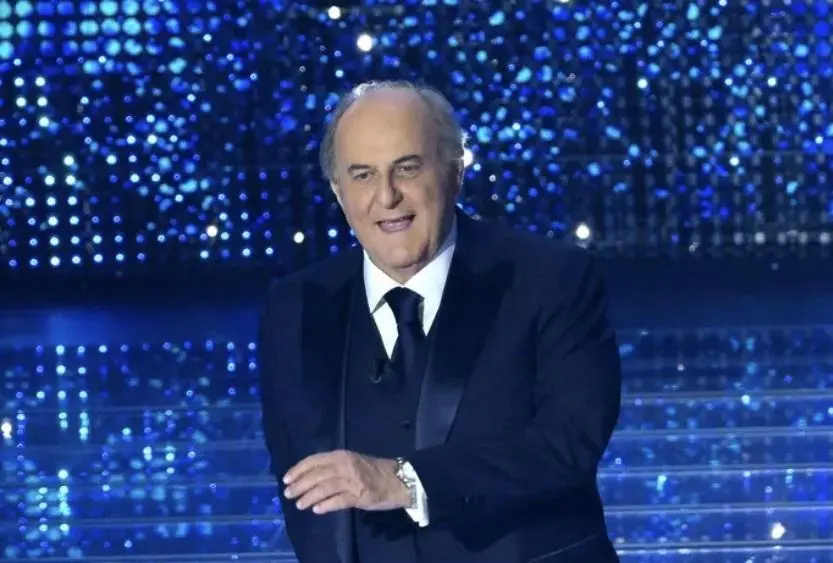 Sanremo veste Lebole. Gli abiti di Gerry Scotti sono griffati amaranto