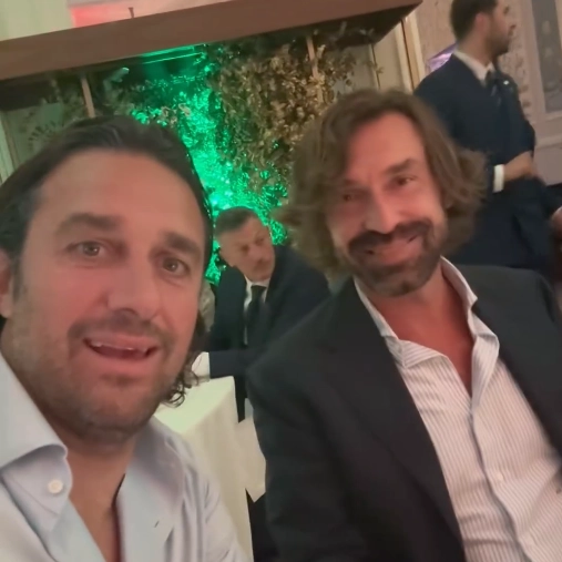 Luca Toni e Andrea Pirlo alla festa per Lippi